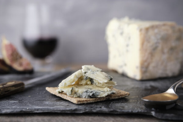 Sperrin blue cheese served on our oat biscuits with a glass of red wine.