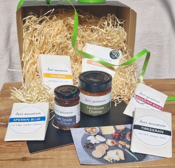 Artisan cheese hamper in eco friendly packaging.
